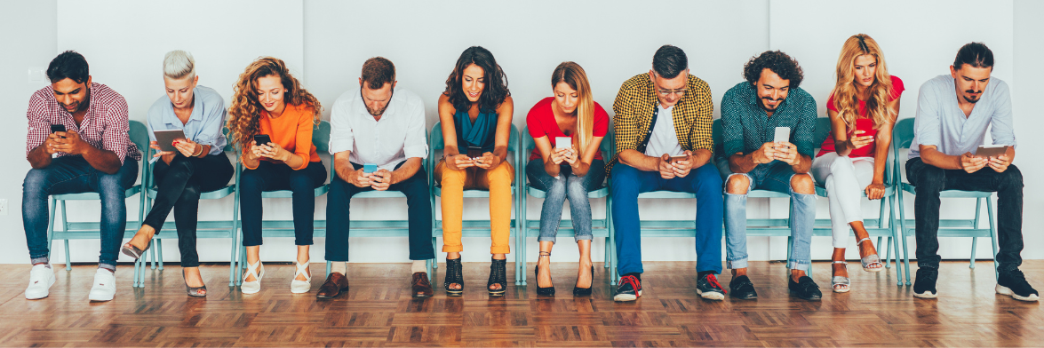 Eight diverse adults sit in a row, each using social media on their smartphones, against a plain backdrop.