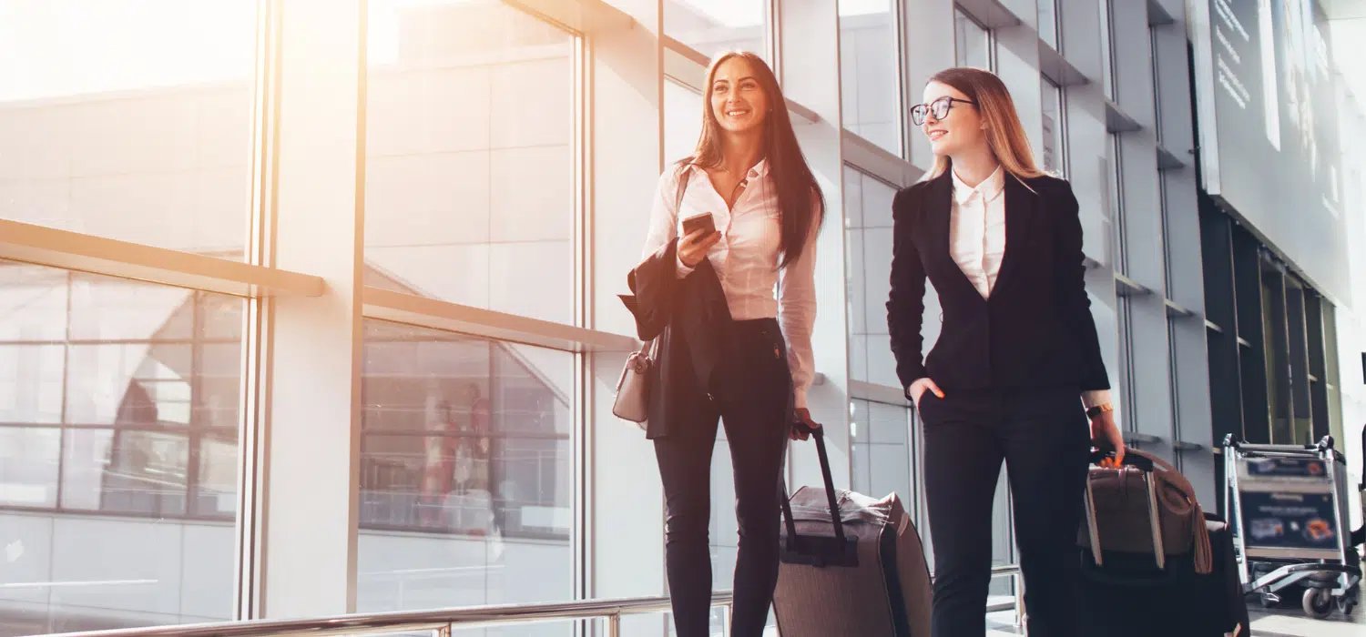 Two small business owners at an airport in Canada