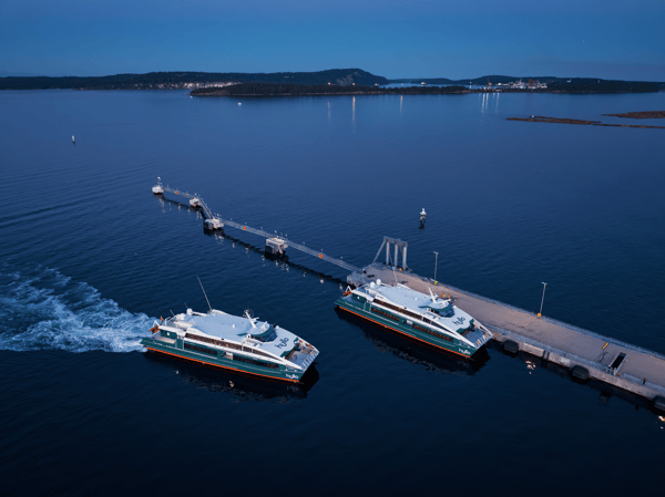 Two Hullo ferries near the port