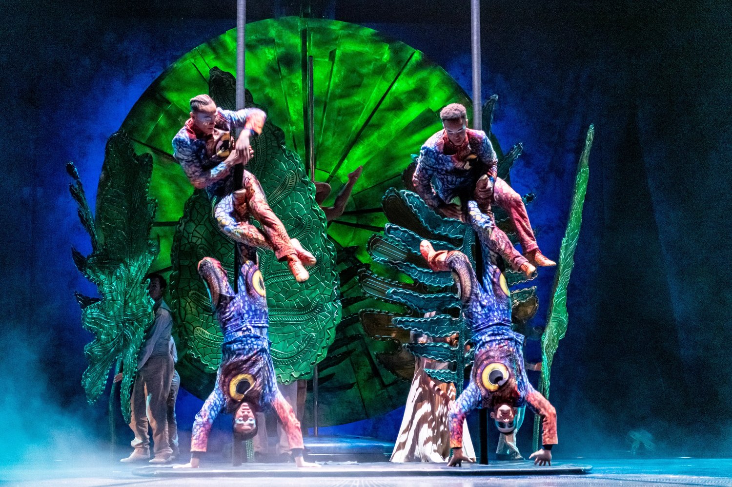 Four Cirque du Soleil performers on stage