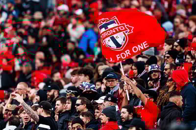 TFC fans waving flags