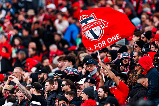 TFC fans waving flags