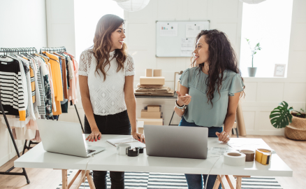 Two small business owners chatting