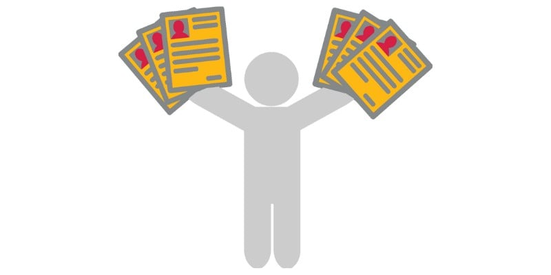 A matchstick figure holding resumes in his hand symbolizing the large number of SK small business owners who are suffering from labour shortage