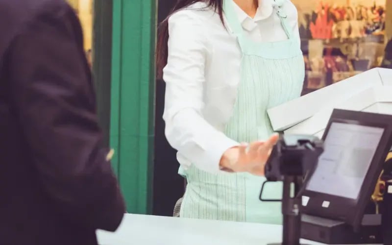 Small business owner in her store