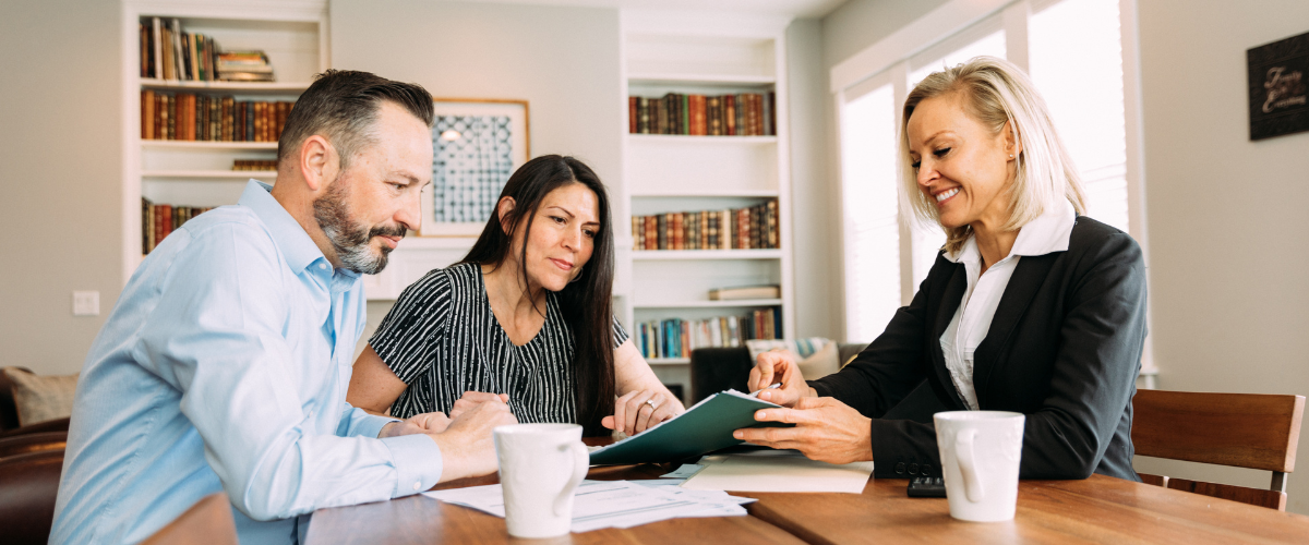 Small business owners meeting with their advisor