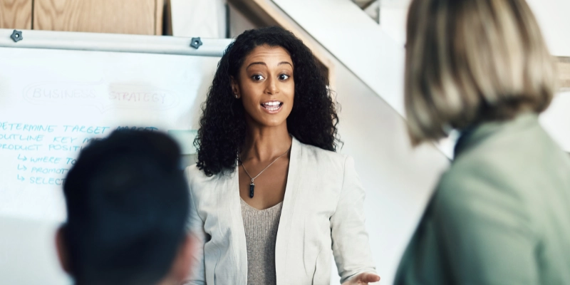 Manager presenting in-front of senior management