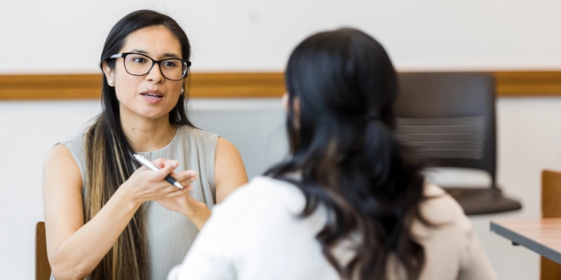 Manager communicating negative feedback to employee