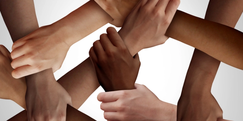 Many hands overlapping