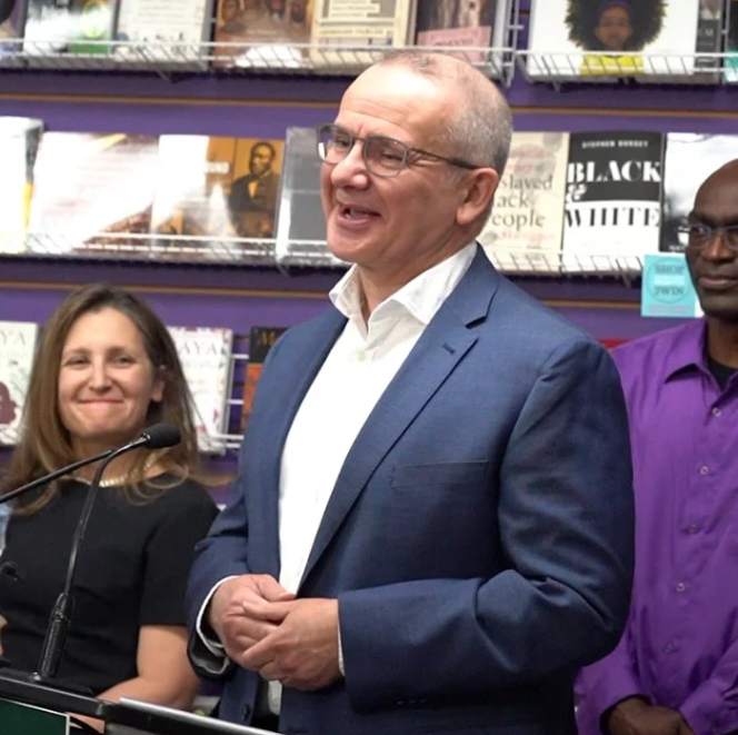 CFIB President Dan Kelly and Canada's Minister of Finance announcing a joint initiative to reduce credit card fees for small businesses in Canada. 