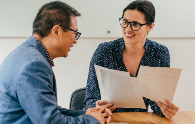 Small business advisor and business owner meeting