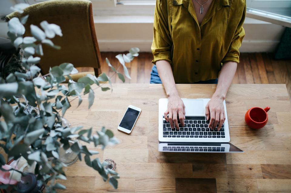 Woman using a laptop to browse the web