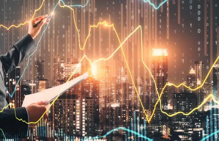 A small business owner drawing time series and numbers related to employment statistics in Canada