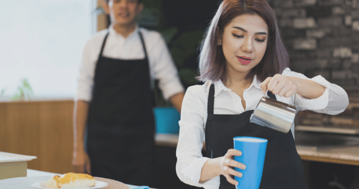 Small business owner and employee in her store