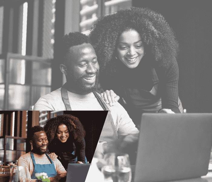 Propriétaires de petites entreprises travaillant sur leur ordinateur portable