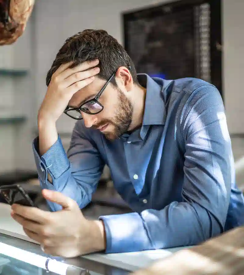 Small business owner checking his costs