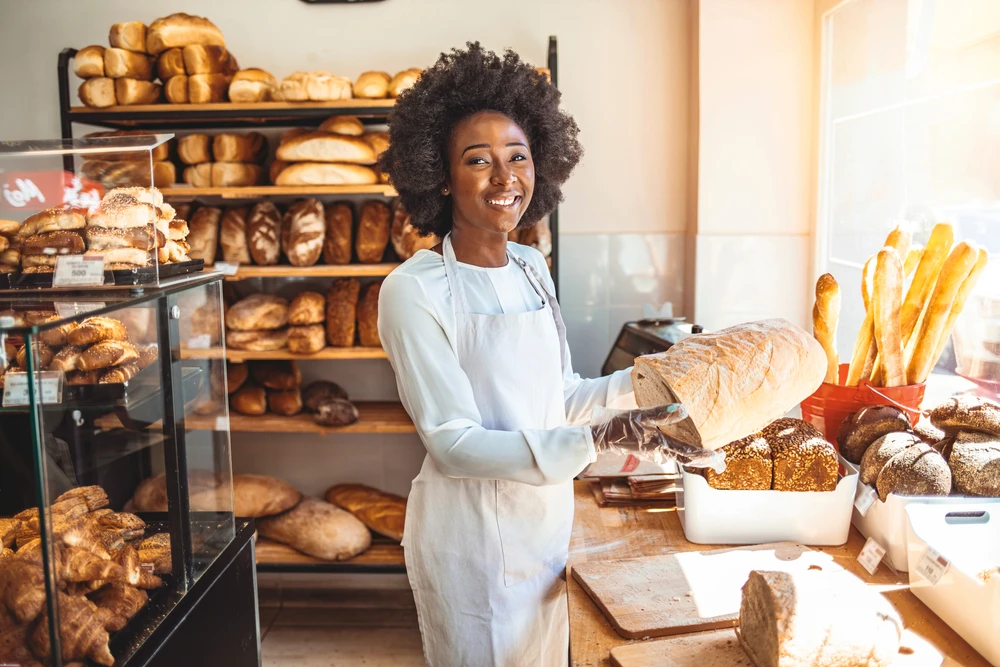 Bakery owner packages bread